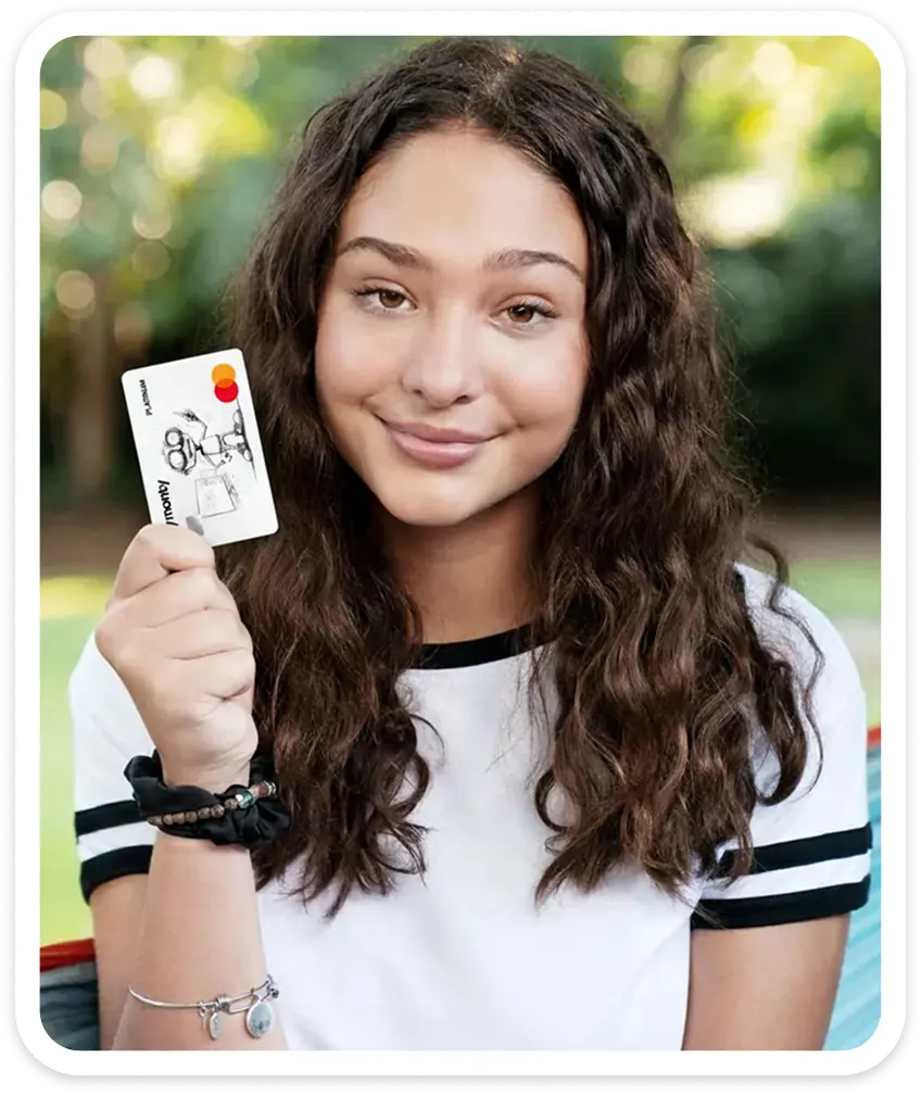 Teen holding card